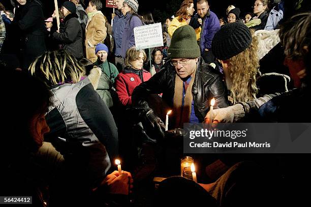 Supporters of Stanley "Tookie" Williams and anti-death penalty supporters gather outside the gates of San Quentin prison moments before Williams was...