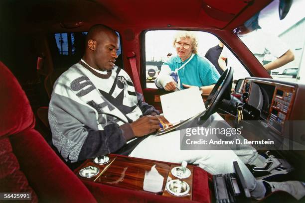 Shaquille O'Neal of the Orlando Magic signs autographs circa 1994. NOTE TO USER: User expressly acknowledges and agrees that, by downloading and or...