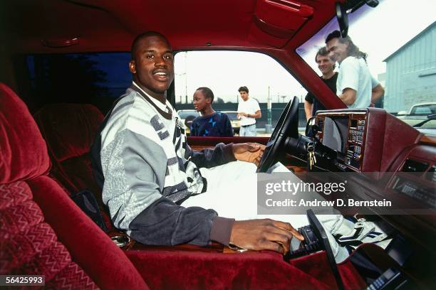 Shaquille O'Neal of the Orlando Magic waits in his car after a game circa 1994. NOTE TO USER: User expressly acknowledges and agrees that, by...