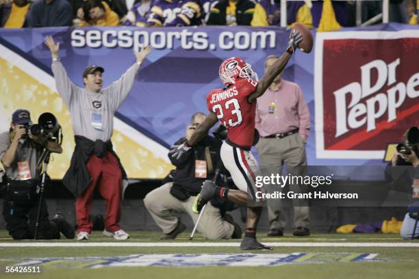 Cornerback Tim Jennings of the Georgia Bulldogs scores on an interception return against the LSU Tigers during the 2005 SEC Football Championship...