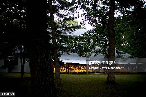 The evening service is underway under the warm glow of tabernacle lights on the grounds of the Eaton Rapids Campmeeting on July 30, 2005 in Eaton...