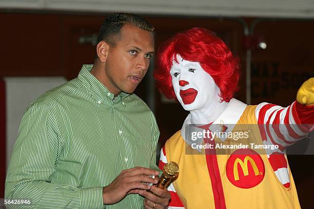 New York Yankees third baseman and 2005 American League Most Valuable Player Alex Rodriguez appears with Ronald McDonald at the Boys and Girls Club...