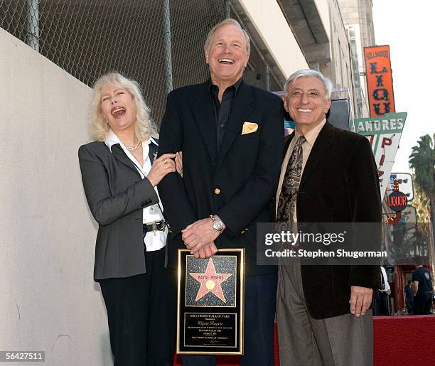 Actors Loretta Swit, Wayne Rogers and Jamie Farr attend a ceremony honoring Rogers with a star on the Hollywood Walk of Fame December 13, 2005 in...