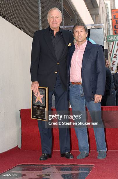 Actor Wayne Rogers and Richard Wilkes attend a ceremony honoring Rogers with a star on the Hollywood Walk of Fame December 13, 2005 in Hollywood,...