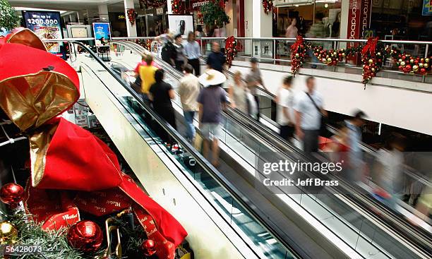 Shoppers are pictured at Westfield St Lukes Mall December 14, 2005 in Auckland, New Zealand. With only eleven days until Christmas, shoppers have...