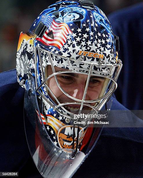 Goaltender Rick DiPietro of the New York Islanders looks on against the Minnesota Wild on December 13, 2005 at Nassau Coliseum in Uniondale, New...