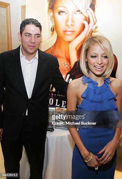 Jeweler Brian Ripka and writer Nicole Richie attends the celebration of her novel "The Truth About Diamonds" at Judith Ripka on December 13, 2005 in...