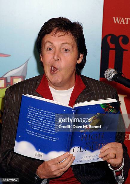 Sir Paul McCartney reads to schoolchildren prior to signing copies of his first children's book "High In The Clouds" at Waterstone's, Piccadilly on...
