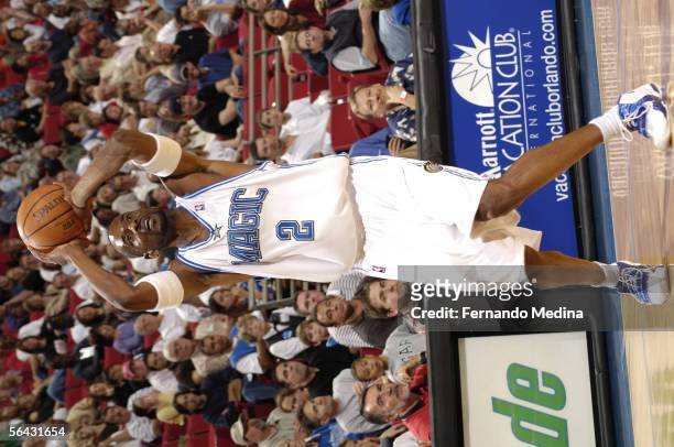Stacey Augmon of the Orlando Magic attempts a shot against the Portland Trail Blazers November 25, 2005 at TD Waterhouse Centre in Orlando, Florida....