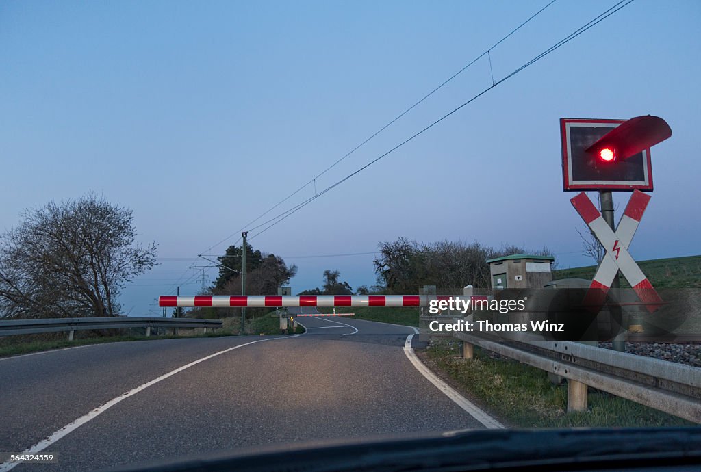 Railroad crossing at dusk