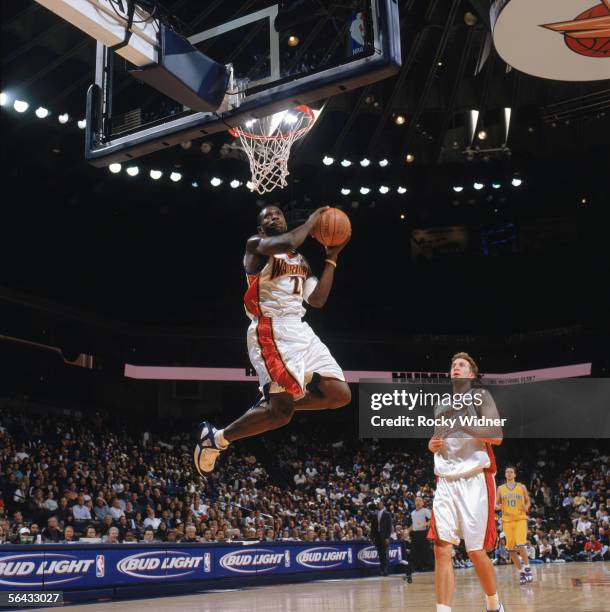Jason Richardson of the Golden State Warriors takes the ball to the basket during a game against the New Orleans/Oklahoma City Hornets at The Arena...