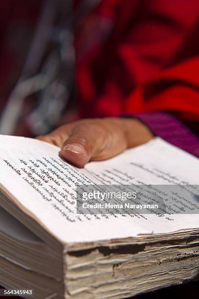 buddhist scriptures - hema narayanan stock pictures, royalty-free photos & images