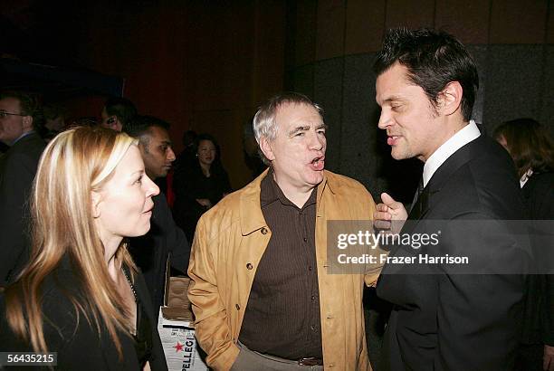 Actor Johnny Knoxville and wife Melanie Clapp speak with Actor Brian Cox at the Hollywood premiere of Fox Searchlight Pictures' "The Ringer" after...