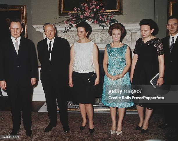 Soviet Premier and statesman, Alexei Kosygin pictured left with Prime Minister of the United Kingdom, Harold Wilson 2nd from left, Kosygin's daughter...