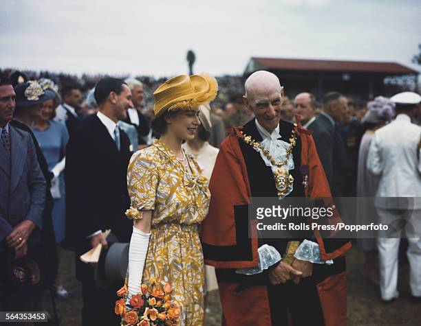 Princess Elizabeth pictured talking to a local mayor at an event at St George's Park in Port Elizabeth during the Royal Tour of South Africa in 1947.