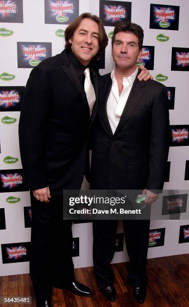 Jonathan Ross and Simon Cowell arrive at the British Comedy Awards 2005 at London Television Studios on December 14, 2005 in London, England.