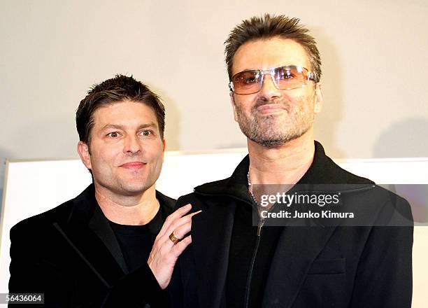 British pop star George Michael and his partner Kenny Goss attend the Japanese Premiere of his film "A Different Story" on December 15, 2005 in...