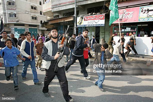 Mourners protest the deaths of Mohammed Joha and Rashad Al-Sen after their funeral at the al-Omary mosque December 15, 2005 in Gaza City, Gaza Strip....