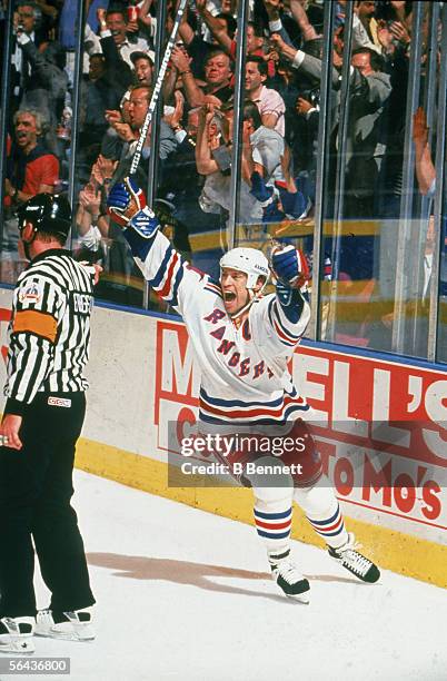 Canadian hockey player Mark Messier of the New York Rangers celebrates his cup-winning goal during game 7 of the Stanley Cup finals against the...