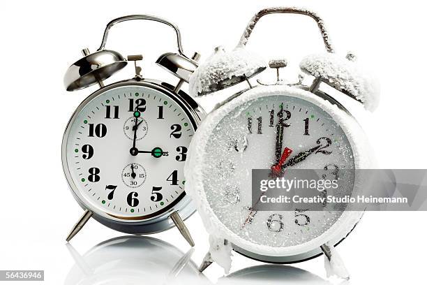 alarm clocks, close-up - time change stock pictures, royalty-free photos & images