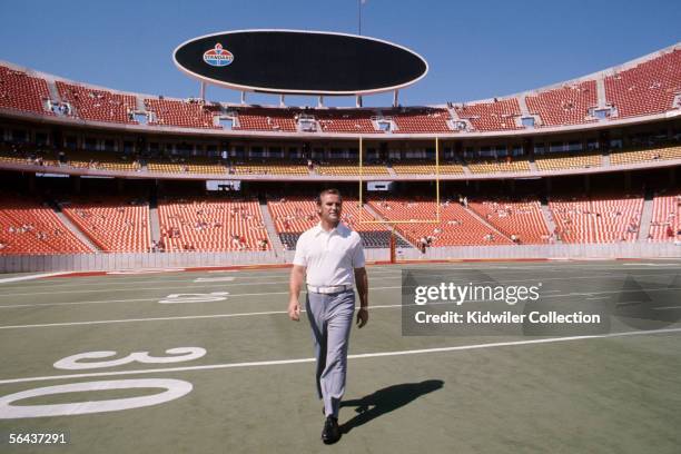 Head coach Don Shula, of the Miami Dolphins, walks onto the field prior the first game of the regular season against the Kansas City Chiefs on...