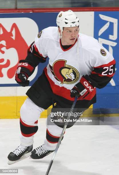 Chris Neil of the Ottawa Senators skates against the Calgary Flames during the NHL game at Pengrowth Saddledome on December 10, 2005 in Calgary,...