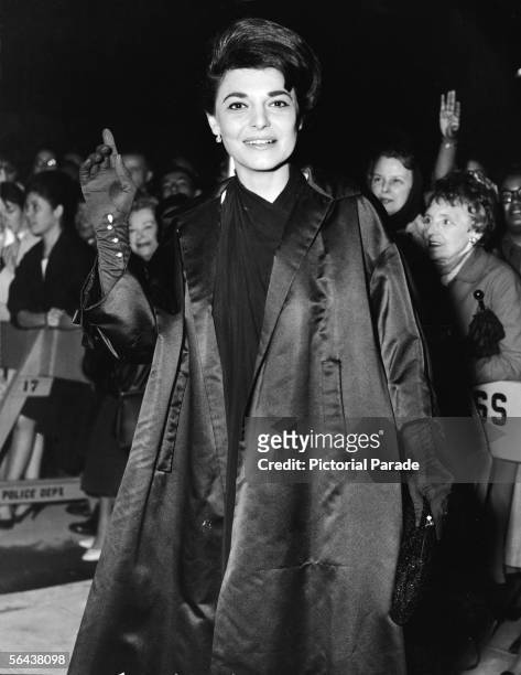 American actress Anne Bancroft arrives at the charity preview for her film 'The Miracle Worker,' which was adapted from the stage production about...