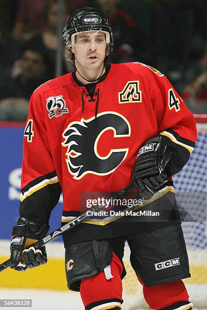 Rhett Warrener of the Calgary Flames skates against the Ottawa Senators during the NHL game at Pengrowth Saddledome on December 10, 2005 in Calgary,...