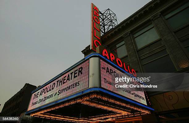 New marquee and vertical sign for Harlem's Apollo Theater is illuminated for the first time December 15, 2005 in New York City. The landmark theater...