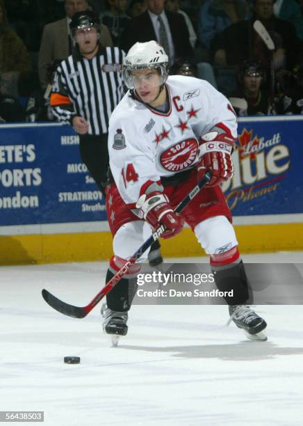 Tyler Kennedy of the Sault Saint Marie Greyhounds controls the puck during the game against the London Knights at the John Labatt Centre on December...