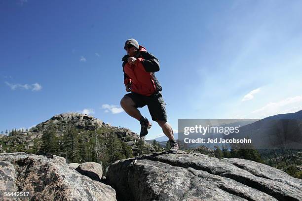 Ski team member Daron Rahlves runs in the mountains on Donner Pass in Truckee, California on October 4, 2005. Rahlves trains in the hills above his...