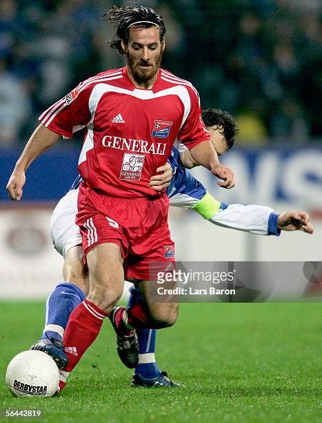 Christoph Teinert of Unterhaching in action with Thomas Zdebel of Bochum during the Second Bundesliga match between VfL Bochum and SpVgg Unterhaching...