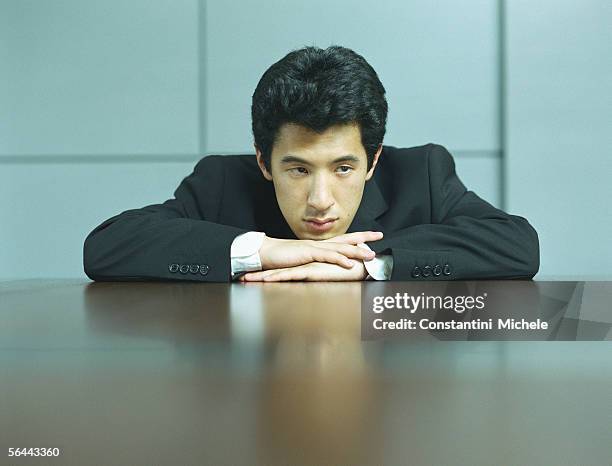 Resting Head Man Resting His Head On Hands Photos and Premium High Res Pictures ...