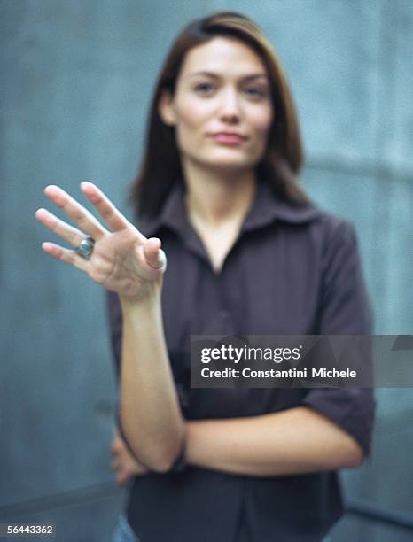 woman gesturing, defocused - refusing stock pictures, royalty-free photos & images