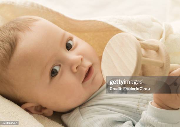 152 Baby Holding Rattle Stock Photos, High-Res Pictures, and Images ...