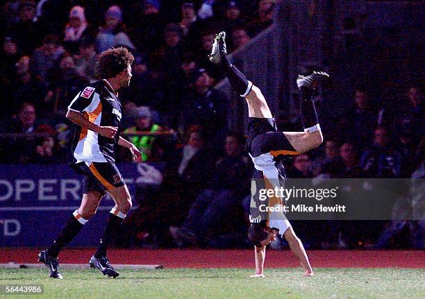 Stuart Elliott of Hull celebrates with team-mate Jason Price after scoring during the Coca-Cola Championship match between Brighton & Hove Albion and...