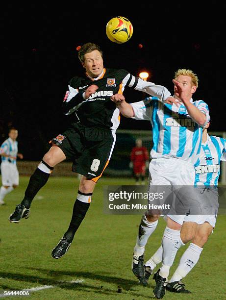 Nick Barmby of during Hull heads clear from Kerry Mayo of Brighton during the Coca-Cola Championship match between Brighton & Hove Albion and Hull...