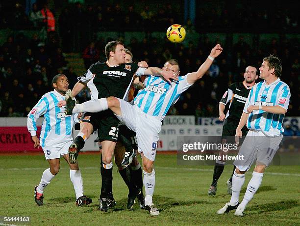 Sam Collins of Hull tangles with Gary Hart of Brighton during the Coca-Cola Championship match between Brighton & Hove Albion and Hull City at the...