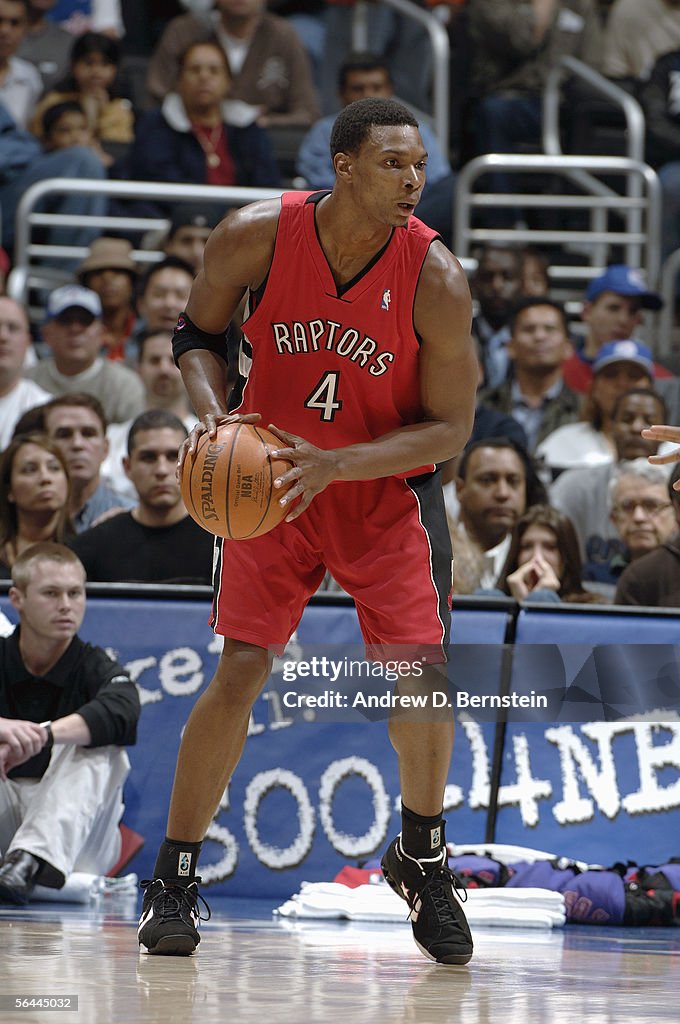 Bosh Raptors Chris Bosh of the Toronto Raptors looks to move the ball against the ...