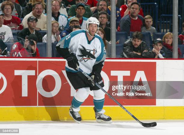 Joe Thornton of the San Jose Sharks looks to make a play from the wing against the Buffalo Sabres during their NHL game on December 2, 2005 at HSBC...