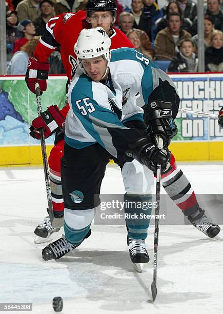 Grant Stevenson of the San Jose Sharks tries for the backhand shot against the Buffalo Sabres during their NHL game on December 2, 2005 at HSBC Arena...