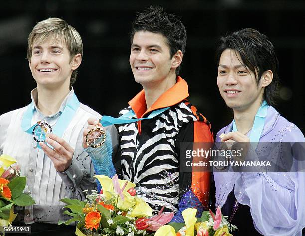 Accompanied by second-placed Canadian skater Jeffrey Buttle and third-placed Japanese skater Daisuke Takahashi , Stephane Lambiel of Switzerland...