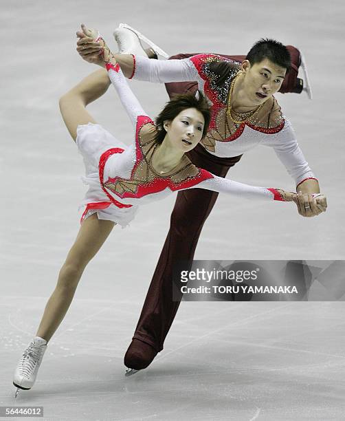 Zhang Dan of China and her partner Zhang Hao perform during their free skating of pair event in the figure skating Grand Prix series final in Tokyo,...
