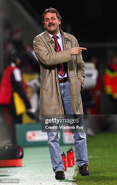 Coach Peter Neururer of Hanover gives instructions from the touchline during the Bundesliga match between Bayer Leverkusen and Hanover 96 at the...