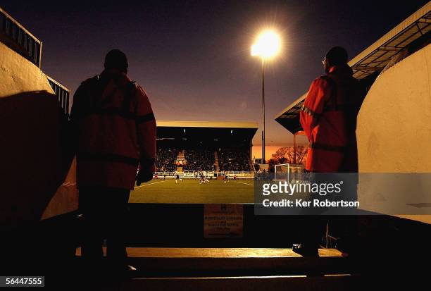 Match stewards watch from the stand during the Barclays Premiership match between Fulham and Blackburn Rovers at Craven Cottage on December 17, 2005...
