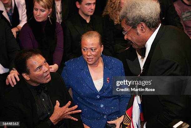 Muhammad Ali and his wife, Lonnie Ali talk with boxing promoter Don King during the Super Middleweight fight between Laila Ali and Asa Maria Sandell...