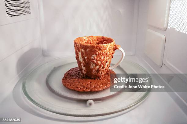 overheating ingredients in a microwave. - microwave mess stock pictures, royalty-free photos & images