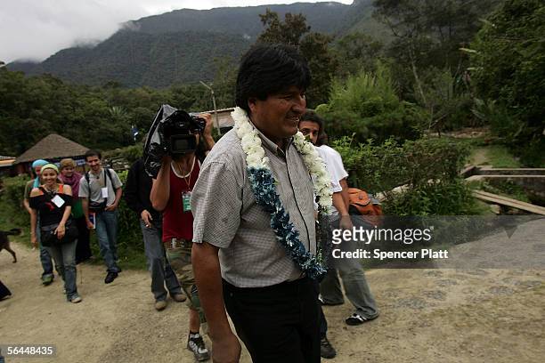 Bolivian Presidential Candidate Evo Morales leaves a restaurant while on his way to Chapare December 17, 2005 in Incachaca, Bolivia. Bolivia, one of...
