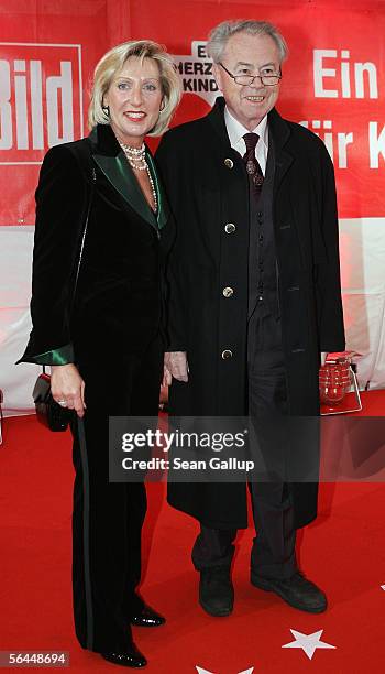 Eduard Zimmermann with guest arrive at the "Ein Herz Fuer Kinder" television charity gala at the Axel Springer December 17, 2005 in Berlin, Germany.