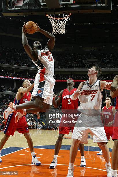 Emeka Okafor of the Charlotte Bobcats gets the rebound in the second half against the Detroit Pistons on December 17, 2005 at the Charlotte Bobcats...